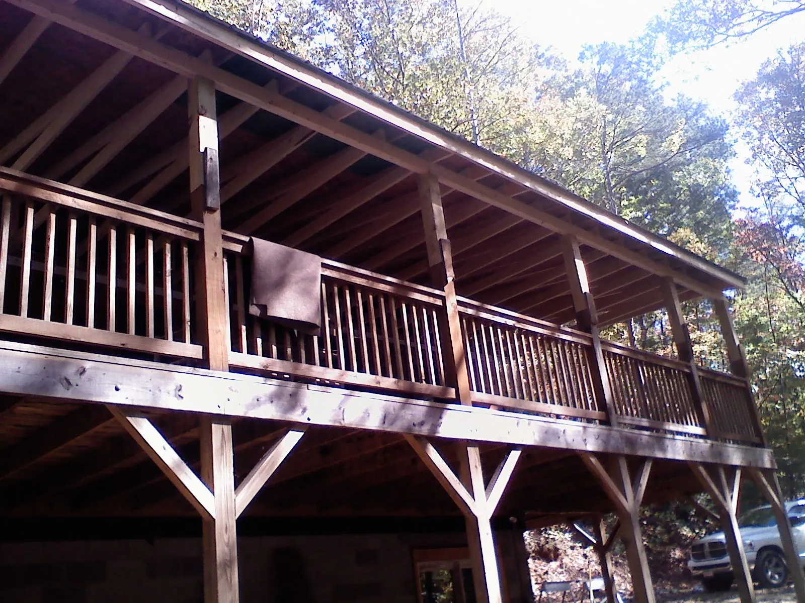 Timber framing under a new elevated porch and deck — Roof Leak Repair in Sabina by Roofing Brothers